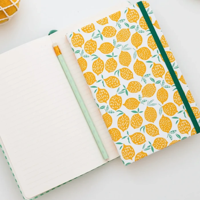 Elevate your note-taking with Set of 2 Lemon Rubber Striped Notebooks - 13x21 cm, Lined